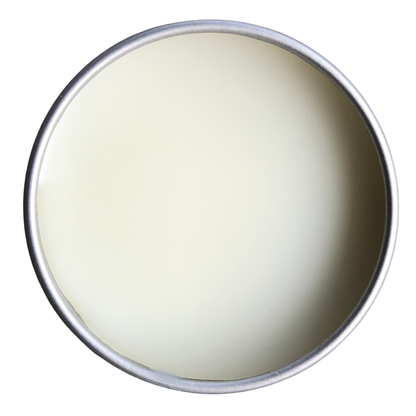 Smoke Camp Crafts Chamomile Salve, 1 oz—this round, shallow metal tin holds a smooth, pale yellow moisturizer for dry skin, viewed from above against a white background; perfect for soothing and calming.